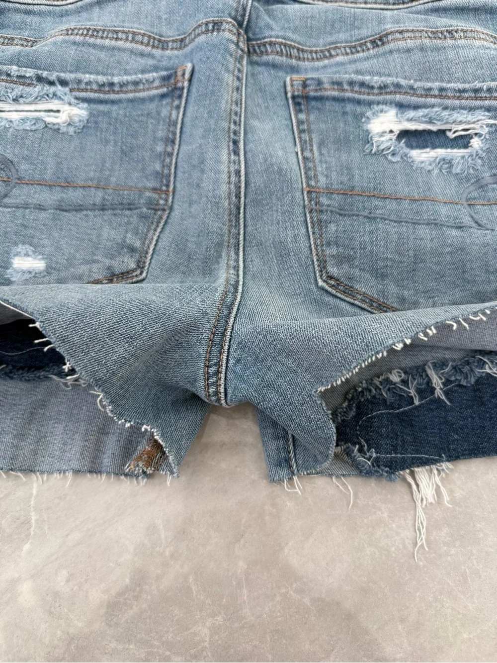 Women’s American Eagle Hi-Rise Super Stretch Hand Cut Off Shorts Distressed 4